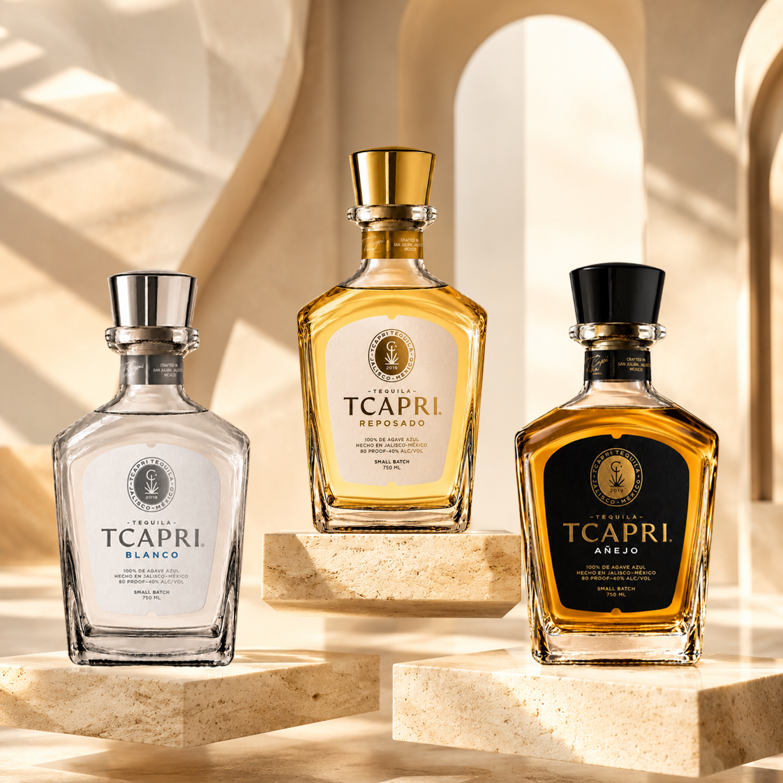Three bottles of Tcapri tequila on a decorative shelf with a warm, neutral background.